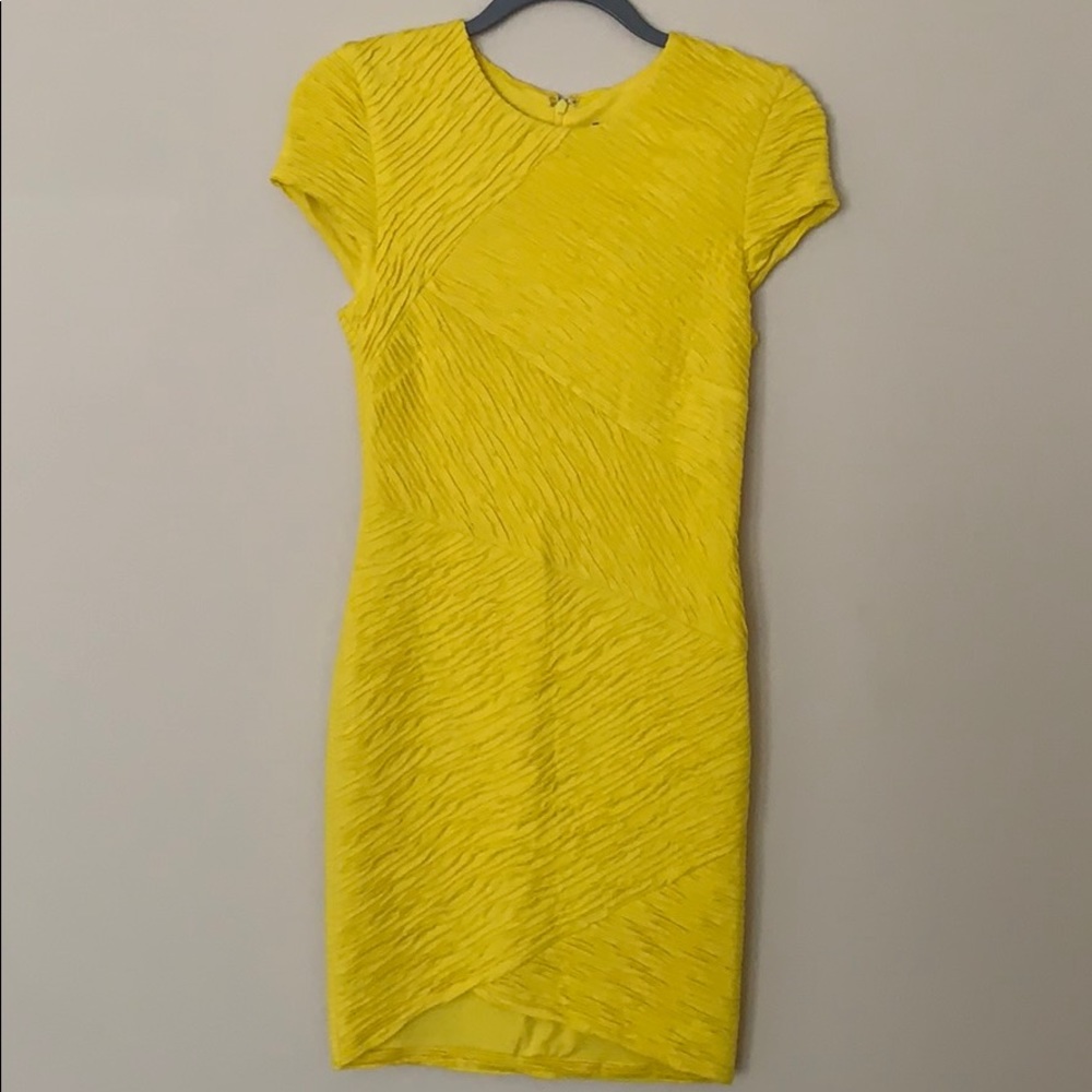 Bright yellow, form fitting, Ronny Kobo dress